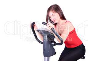 girl on cross trainer fitness exercise