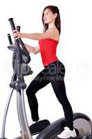 girl fitness exercise with cross trainer