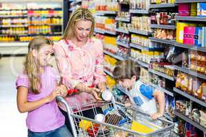 Mother and kids at the supermarket