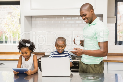 Father and children in the kitchen