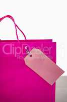 Pink gift bag with tag