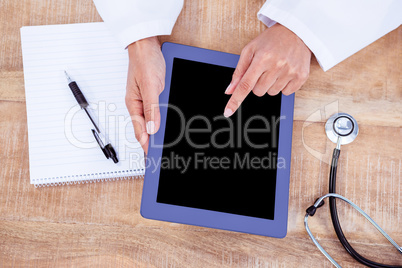 Doctor using digital tablet