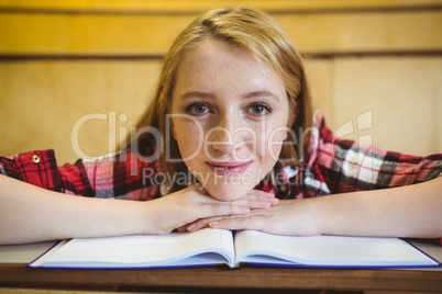 Blonde student smiling at the camera