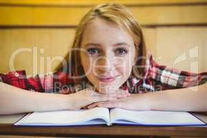 Blonde student smiling at the camera