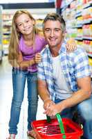 Father and daughter at the supermarket