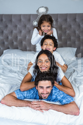 Happy family posing for camera