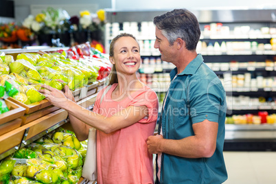 Happy couple at the supermarket