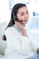 Smiling businesswoman with headset