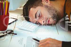 Man asleep at his desk