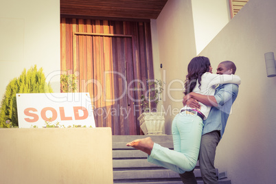 Happy couple after buying new house