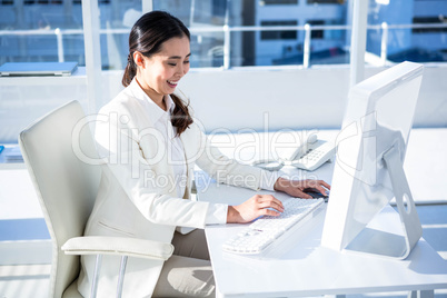 Close up of a woman using a mouse