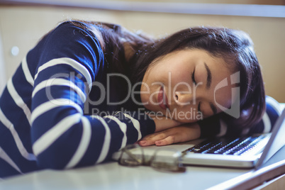 Sleeping student in lecture hall