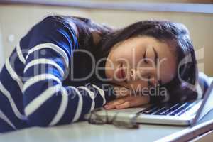 Sleeping student in lecture hall