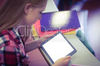 Blonde student using tablet during class