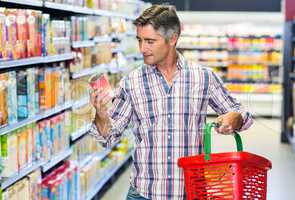 Man reading nutritional values