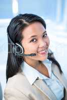 Smiling businesswoman with headset