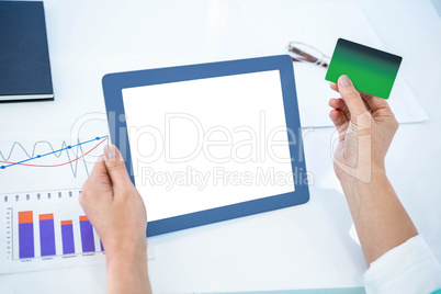 Businesswoman using her tablet pc