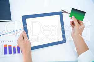 Businesswoman using her tablet pc
