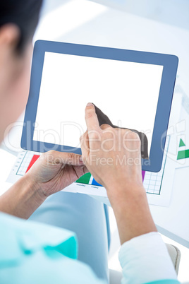 Businesswoman using her tablet pc