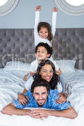 Happy family posing for camera