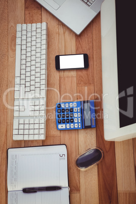 Business desk with computer and smartphone