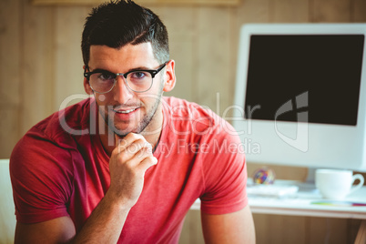 Handsome man smiling at camera