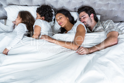 Family sleeping together