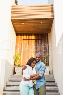 Happy couple after buying new house