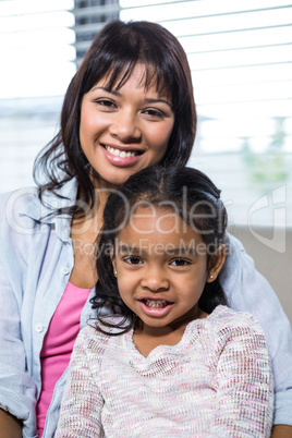 Portrait of happy mother with her daughter