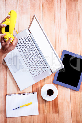 Overhead of feminine hands holding headphones