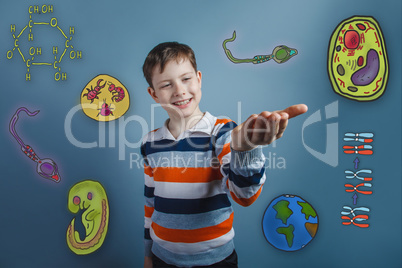 Boy smiling and holding in the palm of icons biology education f