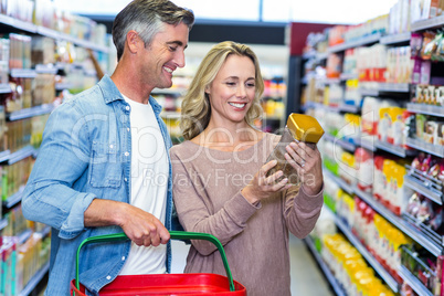 Smiling couple looking for coffee