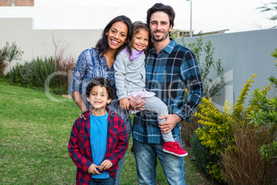 Smiling family in the garden