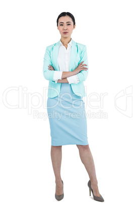 Elegant businesswoman with crossed arms