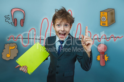Teenage boy holding a tablet businessman raised his finger up an