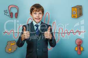 Teenage boy in a business style suit shows a sign of his hands a
