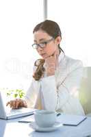 Businesswoman using her laptop pc