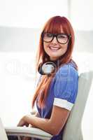 Attractive hipster woman with headset