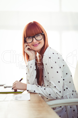 Attractive hipster woman using graphics tablet