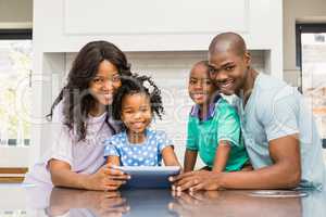 Happy family using tablet