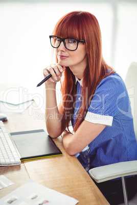 Attractive hipster woman thinking