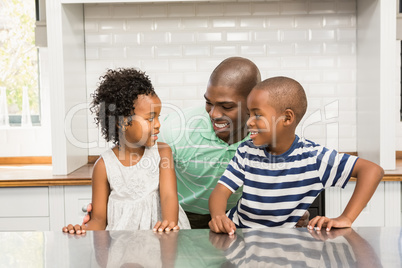 Father and children in the kitchen