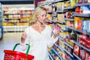 Woman reading nutritional values