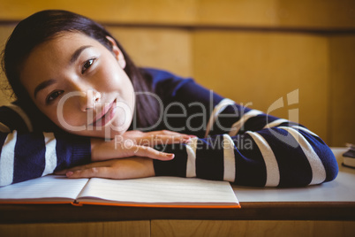 Smiling student in lecture hall