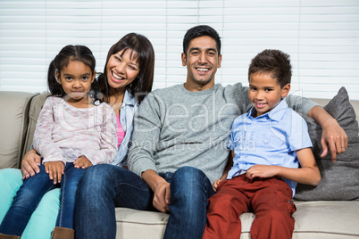 Happy family on the sofa