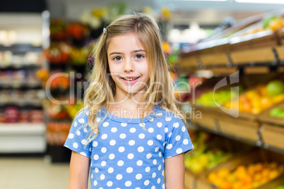 Smiling young girl looking at camera