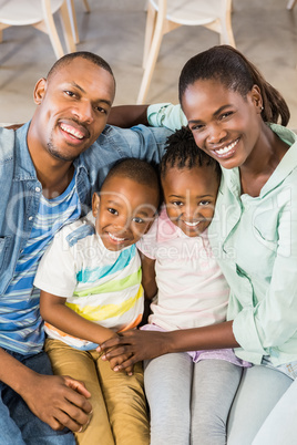 Happy family relaxing on the couch