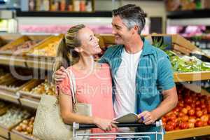 Couple shopping in grocery store