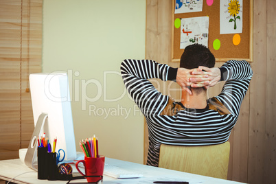 Man relaxing at his desk