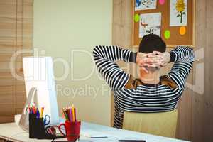 Man relaxing at his desk